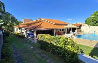 Imagem: A casa possui 2 Dormitórios, 1 Banheiro, 2 Vagas na garagem