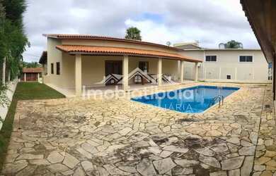 Imagem: A casa em condomínio possui 5 Dormitórios, 5 Banheiros, 5