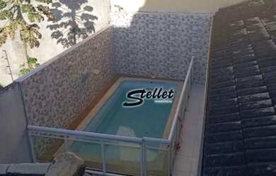 Imagem: A casa possui 3 Dormitórios, 3 Banheiros, 2 Vagas na garagem