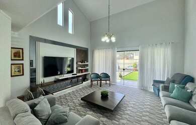 Imagem: A casa possui 5 Dormitórios, 5 Banheiros, 4 Vagas na garagem