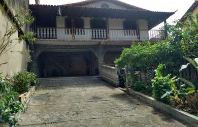 Imagem: A casa possui 4 Dormitórios, 400m² de Área e está localizado