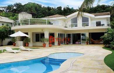 Imagem: A casa possui 5 Dormitórios, 5 Banheiros, 5 Vagas na garagem