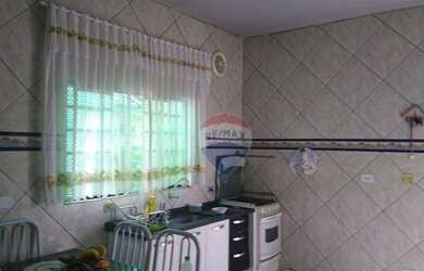 Imagem 3: Sobrado com casa no piso superior e salão no piso inferior à venda por...