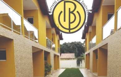 Imagem: A casa possui 2 Dormitórios, 3 Banheiros, 1 Vaga na garagem