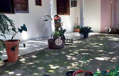 Imagem: A casa possui 3 Dormitórios, 3 Banheiros, 2 Vagas na garagem