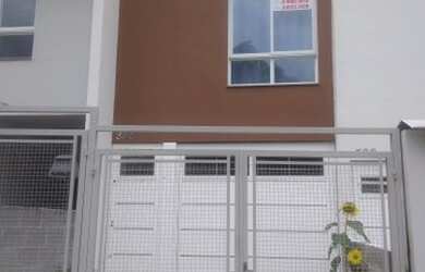 Imagem: A casa possui 2 Dormitórios, 1 Banheiro, 2 Vagas na garagem