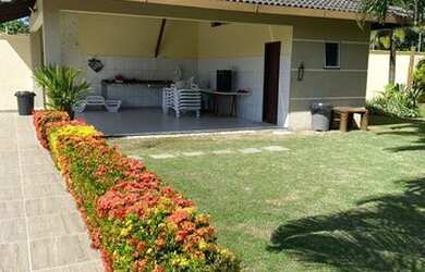 Imagem: A casa possui 3 Dormitórios, 3 Banheiros, 3 Vagas na garagem