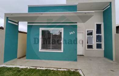 Imagem: A casa possui 2 Dormitórios, 1 Banheiro, 2 Vagas na garagem