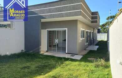 Imagem: A casa possui 3 Dormitórios, 2 Banheiros, 3 Vagas na garagem