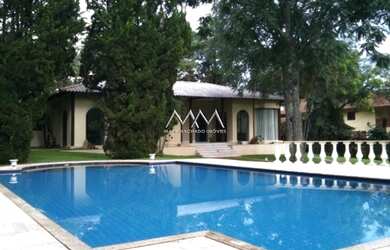 Imagem: A casa possui 3 Dormitórios, 4 Banheiros, 4 Vagas na garagem