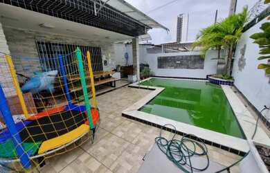 Imagem: A casa possui 4 Dormitórios, 4 Banheiros, 3 Vagas na garagem