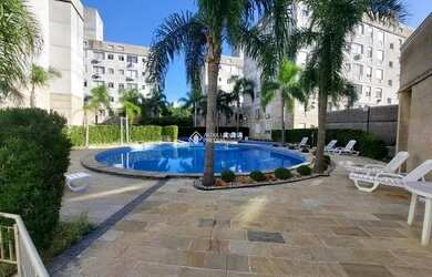 Imagem: O apartamento possui 2 Dormitórios, 1 Banheiro, 1 Vaga na garagem