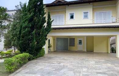 Imagem: A casa em condomínio possui 5 Dormitórios, 5 Banheiros, 5