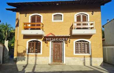 Imagem: A casa em condomínio possui 5 Dormitórios, 5 Banheiros, 3