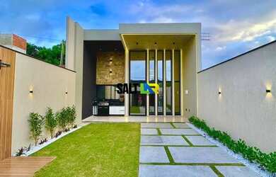 Imagem: A casa possui 3 Dormitórios, 3 Banheiros, 2 Vagas na garagem