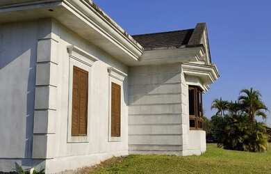 Imagem: A casa possui 3 Dormitórios, 2 Banheiros, 419m² de Área e