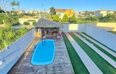 Imagem: A casa possui 3 Dormitórios, 3 Banheiros, 3 Vagas na garagem