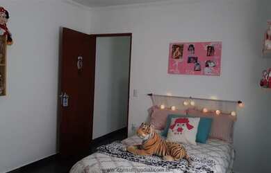 Imagem: A casa possui 2 Dormitórios, 2 Banheiros, 2 Vagas na garagem