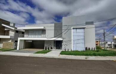 Imagem: A casa em condomínio possui 3 Dormitórios, 4 Banheiros, 2