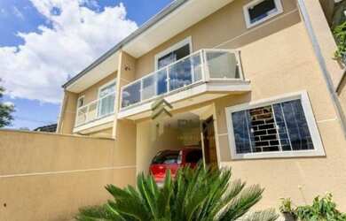 Imagem: A casa possui 3 Dormitórios, 1 Banheiro, 2 Vagas na garagem