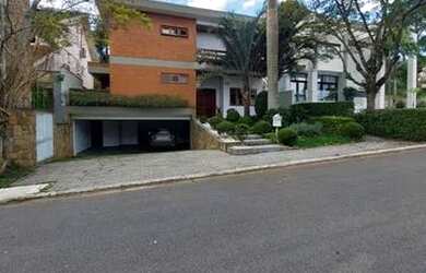 Imagem: A casa em condomínio possui 3 Dormitórios, 5 Banheiros, 4