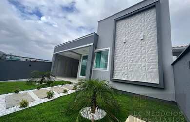 Imagem: A casa possui 3 Dormitórios, 1 Banheiro, 1 Vaga na garagem