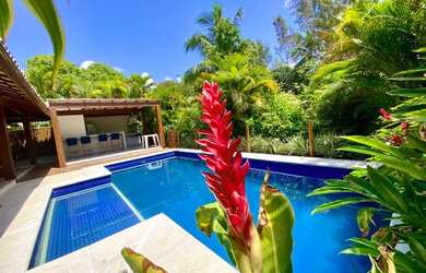 Imagem: A casa possui 5 Dormitórios, 5 Banheiros, 3 Vagas na garagem