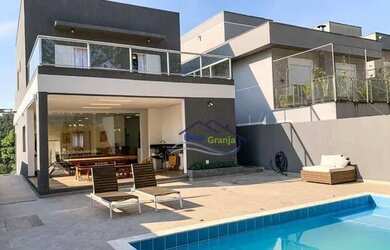 Imagem: A casa em condomínio possui 3 Dormitórios, 5 Banheiros, 5