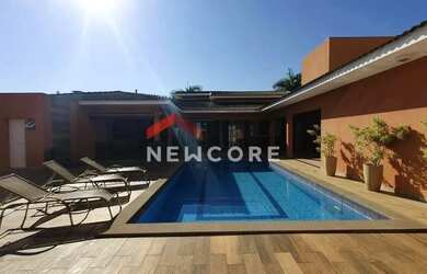 Imagem: A casa em condomínio possui 4 Dormitórios, 5 Banheiros, 2