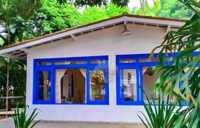 Imagem: A casa possui 4 Dormitórios, 1 Banheiro, 2 Vagas na garagem