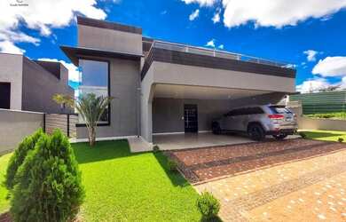 Imagem: A casa possui 3 Dormitórios, 5 Banheiros, 4 Vagas na garagem