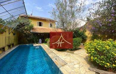 Imagem: A casa possui 5 Dormitórios, 4 Banheiros, 2 Vagas na garagem