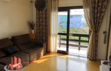 Imagem: A casa possui 5 Dormitórios, 3 Banheiros, 2 Vagas na garagem