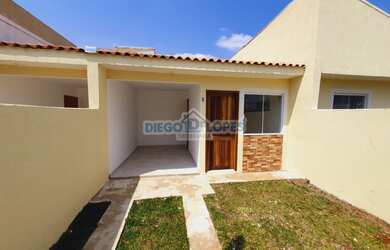 Imagem: A casa possui 2 Dormitórios, 1 Banheiro, 1 Vaga na garagem