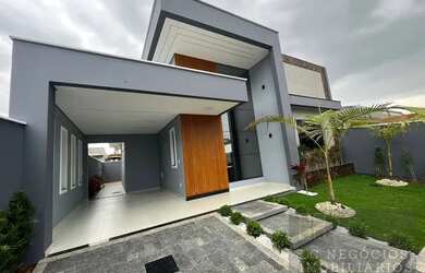 Imagem: A casa possui 3 Dormitórios, 1 Banheiro, 1 Vaga na garagem