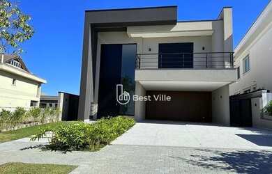 Imagem: A casa em condomínio possui 5 Dormitórios, 5 Banheiros, 4