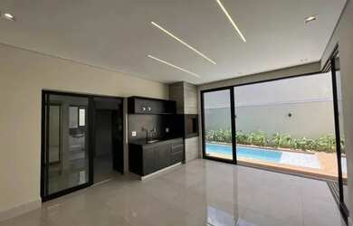 Imagem: A casa possui 3 Dormitórios, 4 Banheiros, 4 Vagas na garagem