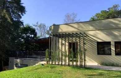 Imagem: A casa em condomínio possui 5 Dormitórios, 5 Banheiros, 5