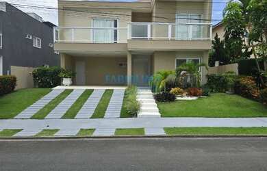 Imagem: A casa em condomínio possui 5 Dormitórios, 5 Banheiros, 4
