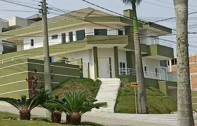 Imagem: A casa possui 5 Dormitórios, 2 Banheiros, 5 Vagas na garagem