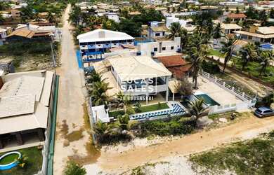 Imagem: A casa possui 5 Dormitórios, 5 Banheiros, 4 Vagas na garagem