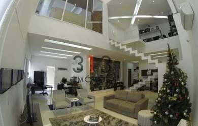 Imagem: A casa possui 5 Dormitórios, 4 Banheiros, 4 Vagas na garagem