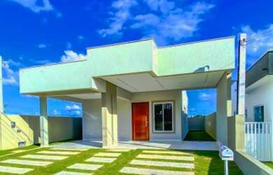 Imagem: A casa possui 3 Dormitórios, 3 Banheiros, 2 Vagas na garagem