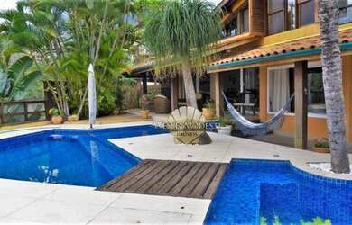 Imagem: A casa possui 5 Dormitórios, 5 Banheiros, 5 Vagas na garagem