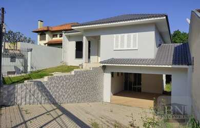 Imagem: A casa possui 2 Dormitórios, 3 Banheiros, 3 Vagas na garagem