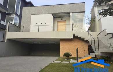 Imagem: A casa em condomínio possui 3 Dormitórios, 5 Banheiros, 5