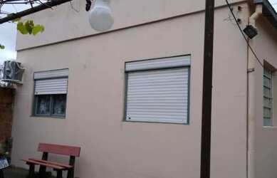 Imagem: A casa possui 4 Dormitórios, 2 Banheiros e está localizado