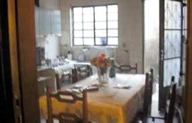 Imagem: A casa possui 2 Dormitórios, 2 Banheiros, 3 Vagas na garagem