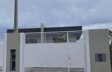 Imagem: A casa possui 3 Dormitórios, 2 Banheiros, 2 Vagas na garagem