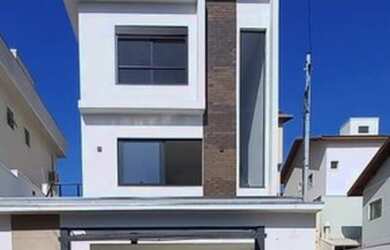 Imagem: A casa possui 3 Dormitórios, 3 Banheiros, 3 Vagas na garagem